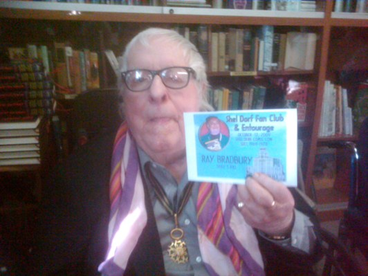 Ray Bradbury showing off his new Shel Dorf Fan Club badge (photo courtesy of Greg Koudoulian)