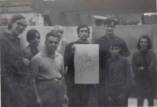 From left to right: Richard Alf, Wayne Kincaid, Jack King Kirby, Mike Towry (in back), Dan Stewart, Bob Sourk, Barry Alfonso (in front), and Sylvia Alfonso. Picture taken on November 9, 1969 at the Kirby-family home in Irvine, California.